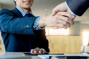 two confident business man shaking hands meeting office success dealing greeting partner concept